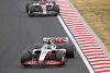 HUNGARORING, HUNGARY - JULY 31: Mick Schumacher, Haas VF-22, leads Valtteri Bottas, Alfa Romeo C42 during the Hungarian GP at Hungaroring on Sunday July 31, 2022 in Budapest, Hungary. (Photo by Zak Mauger / LAT Images)
